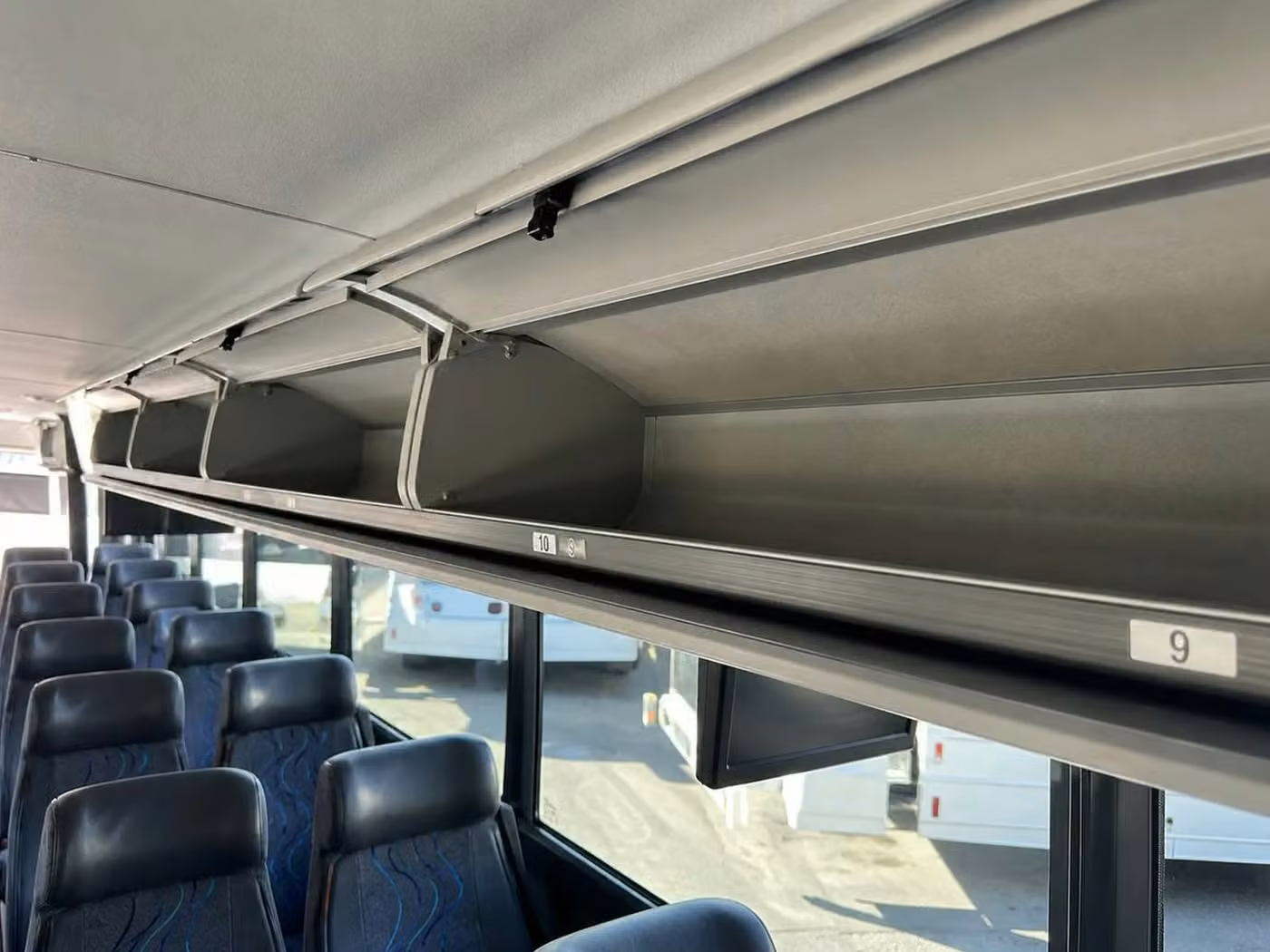 monrovia 18 passenger minibus overhead storage