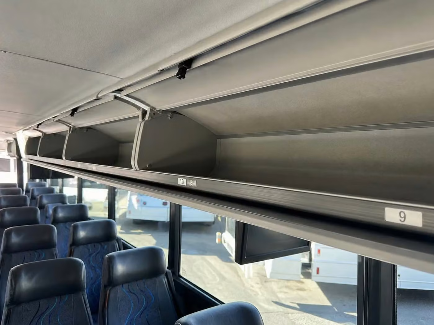 monrovia 25 passenger minibus overhead storage