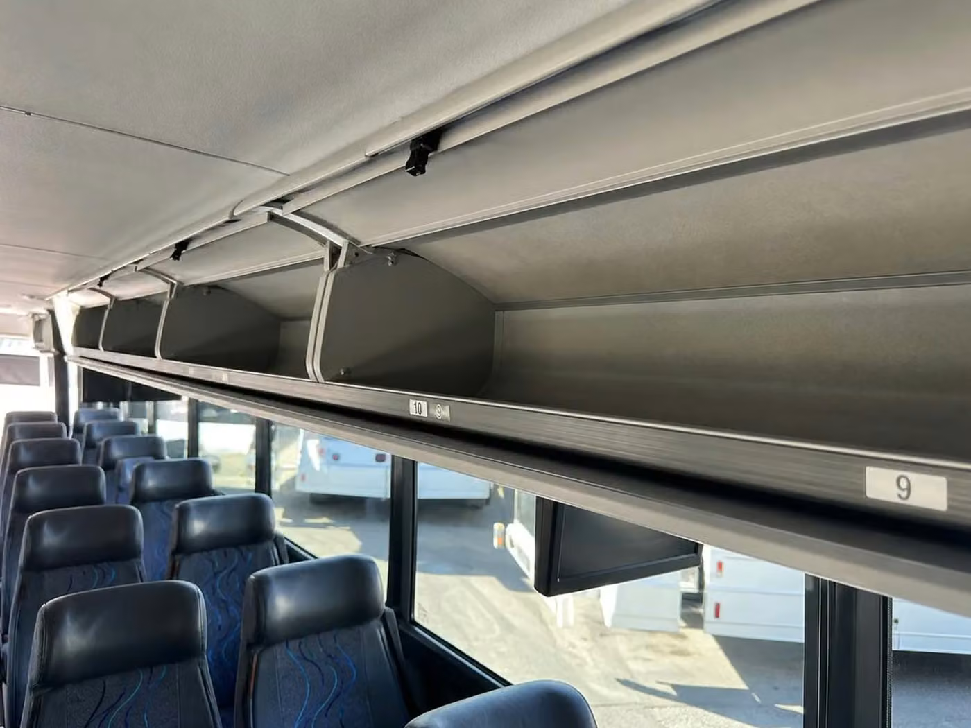 monrovia 28 passenger minibus overhead storage