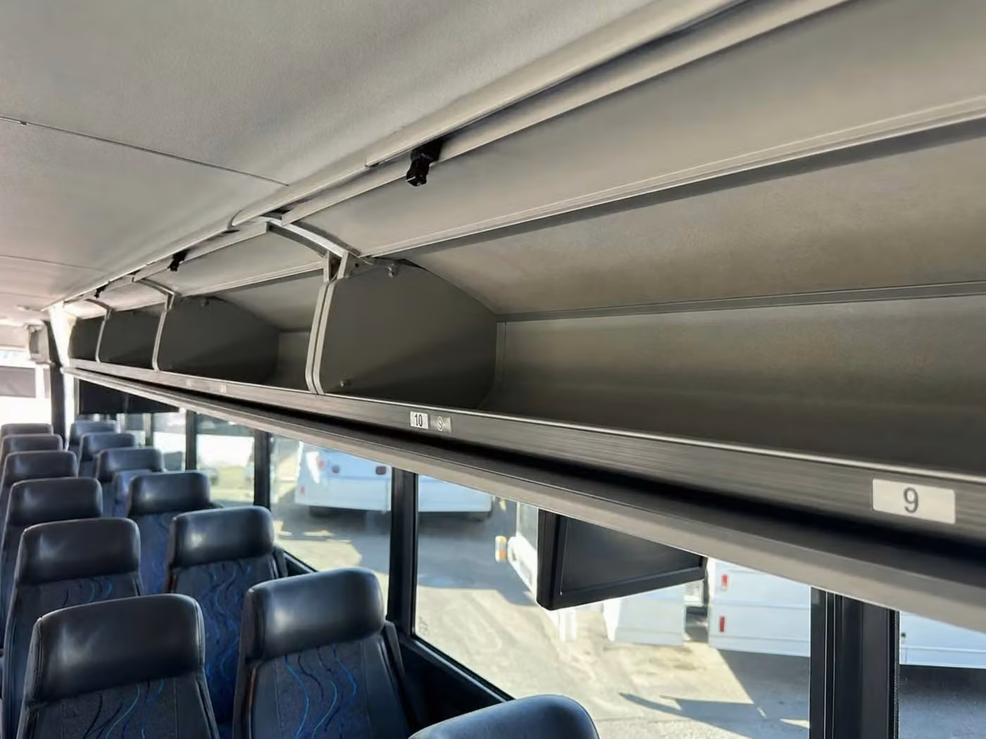 monrovia 35 passenger minibus overhead storage
