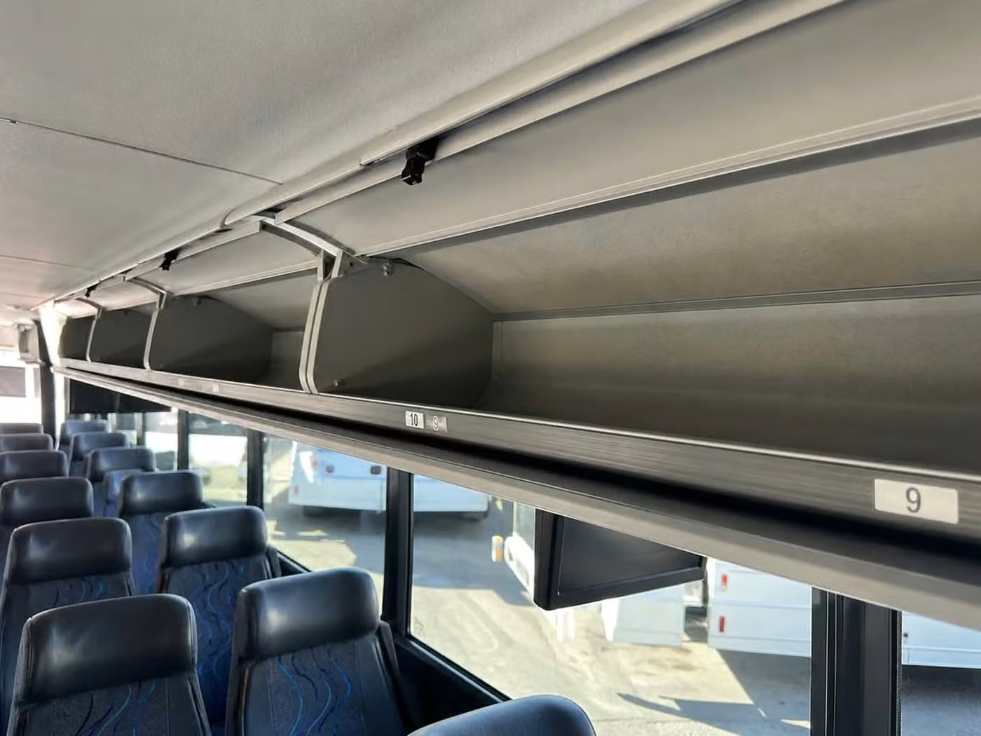 monrovia charter bus overhead storage